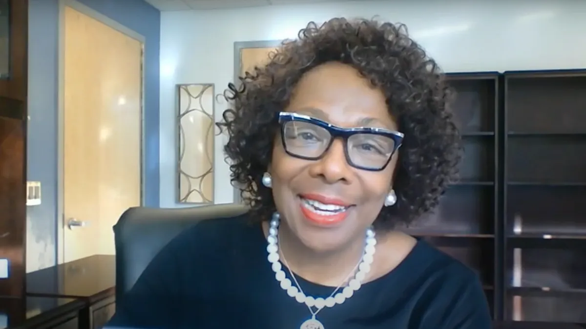 Deborah Wortham, superintendent of Roosevelt Union Free School District in New York, is pictured speaking into a webcam during a video address to her school district.