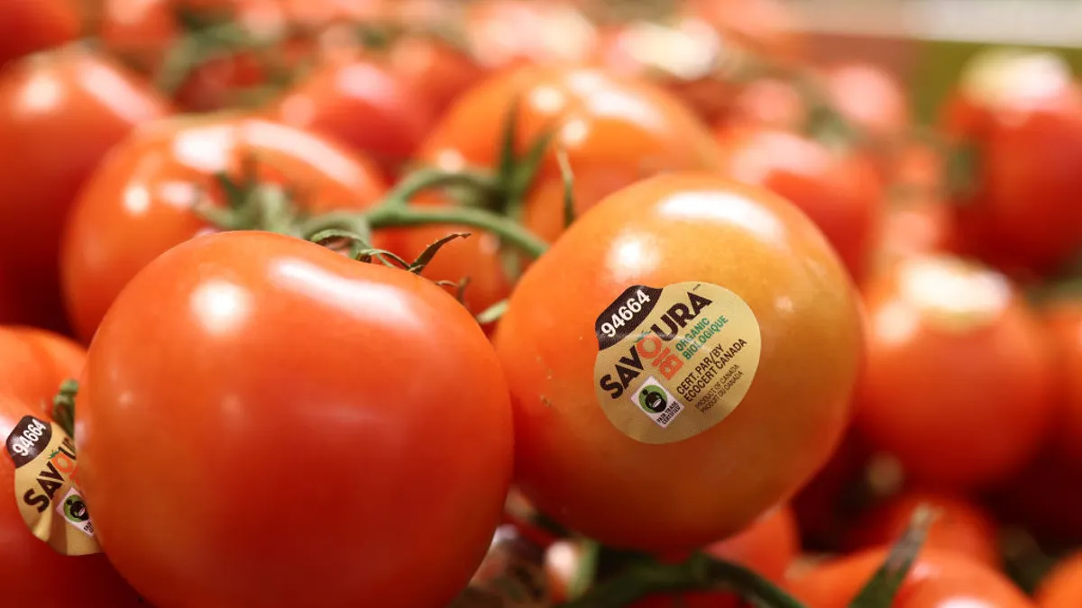 Tomatoes from Canada are displayed for sale at a Whole Foods store.