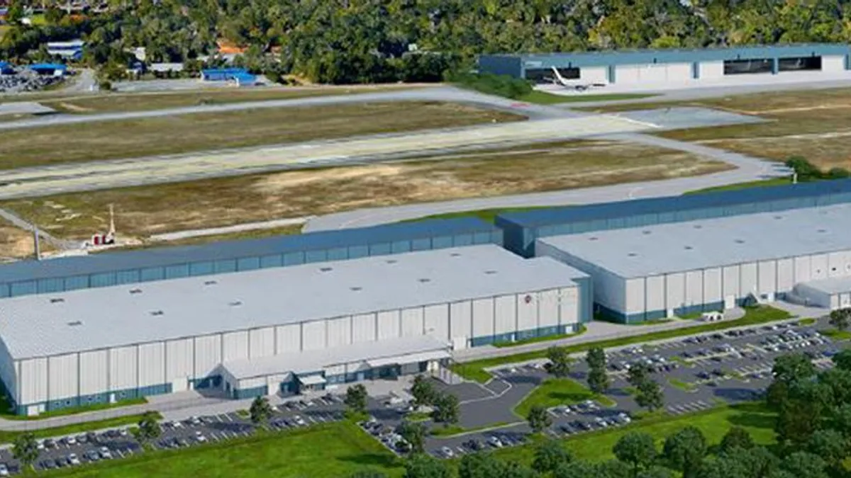 A rendering shows two large airport hangars.