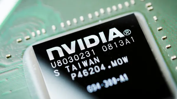 A close-up image of an Nvidia chip on a computer motherboard.