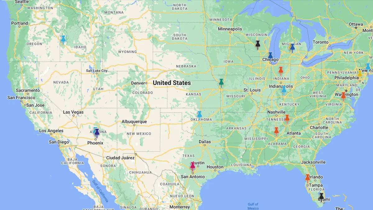 Map of the united states in green, with various colored thumbtack markers.