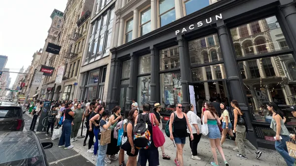 A line of people outside Pacsun's SoHo flagship store.