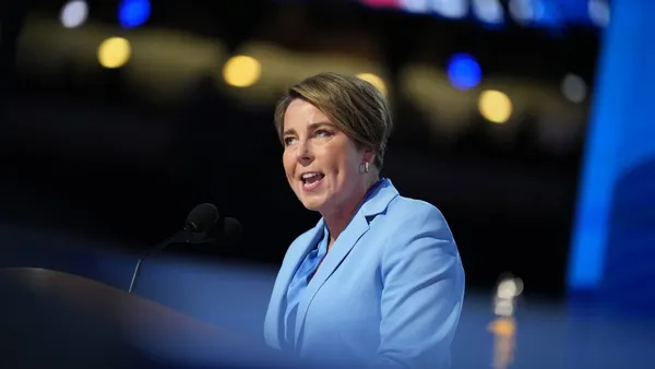 Maura Healey speaks at a podium.