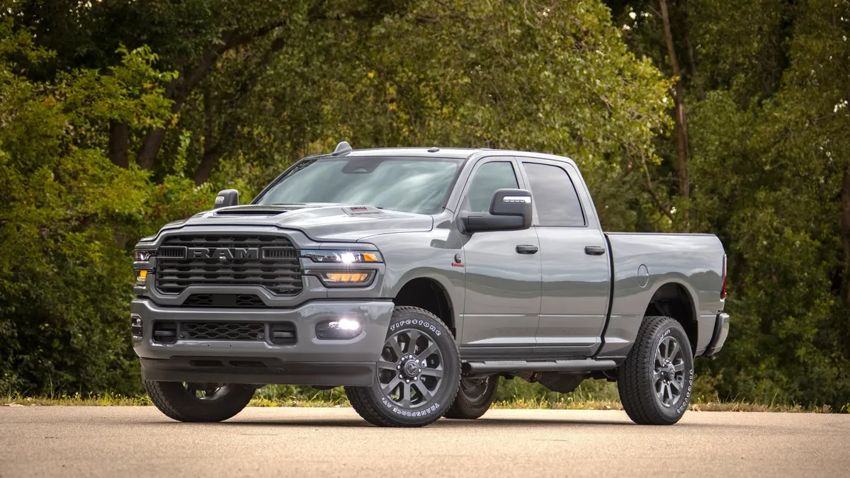 The Ram 2500 Black Express from the front, parked on a dirt lot.
