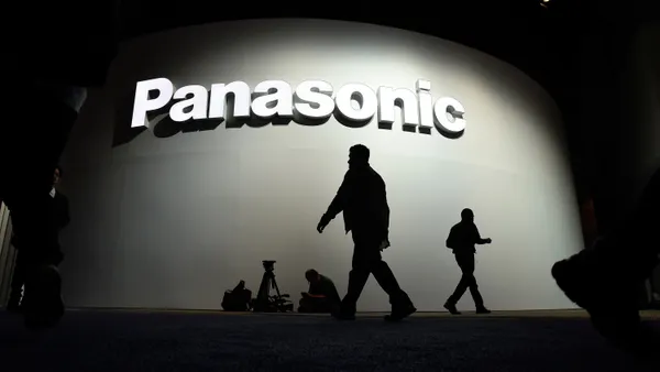 Attendees walk by the Panasonic booth during CES 2018 at the Las Vegas Convention Center on January 9, 2018 in Las Vegas, Nevada.