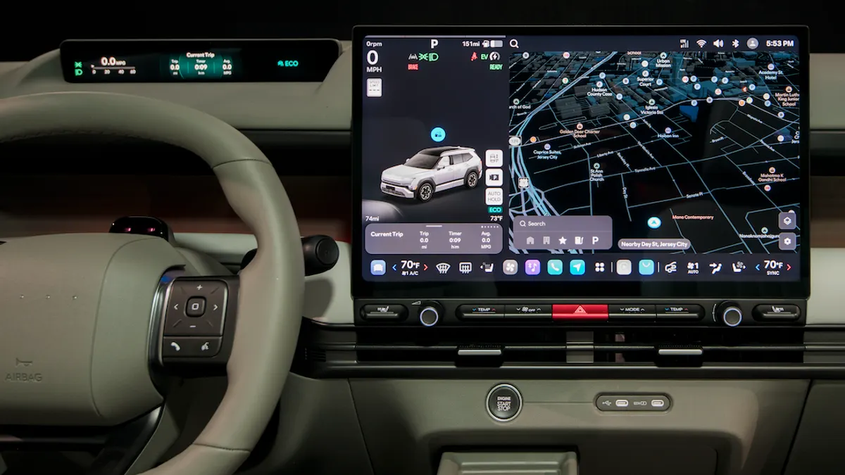 The center infotainment screen showing the Pleos Connect interface in a Hyundai vehicle.