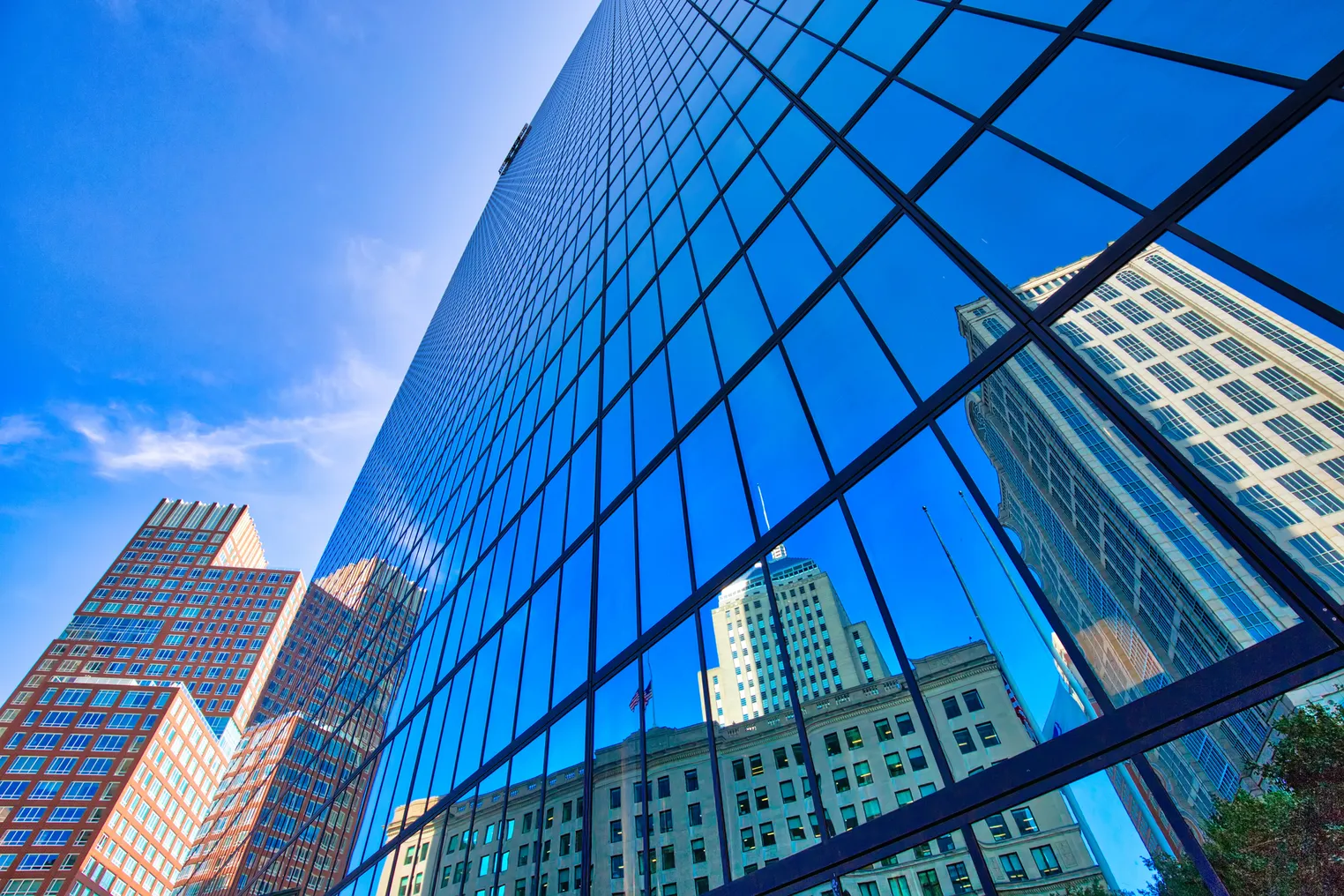 A view of the facades of commercial skyscrapers in Boston's bustling Copley Square