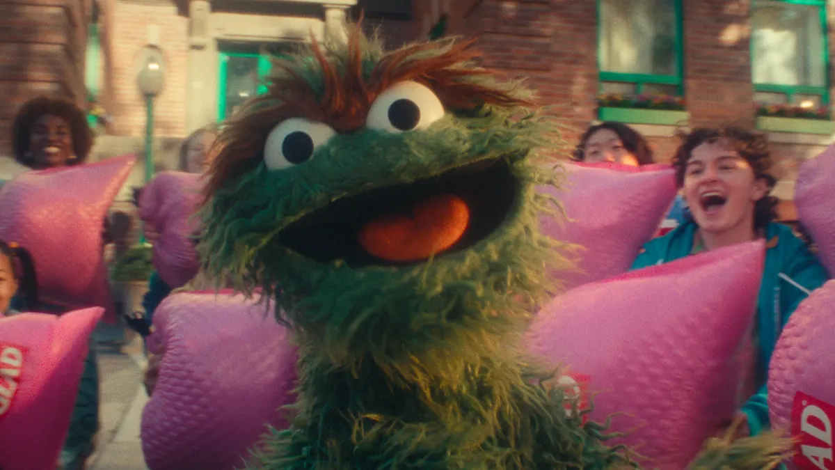 "Sesame Street" character Oscar the Grouch appears in Glad's "Don't Get Mad. Get Glad." campaign.