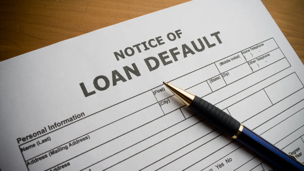 Paper saying notice of loan default