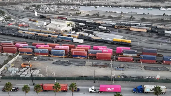 An aerial view of shipping containers on trucks and railcars at the Port of Los Angeles on Dec. 4, 2024.