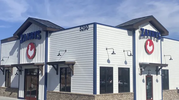 Zaxbys first Arizona unit, a restaurant with white walls and blue awnings