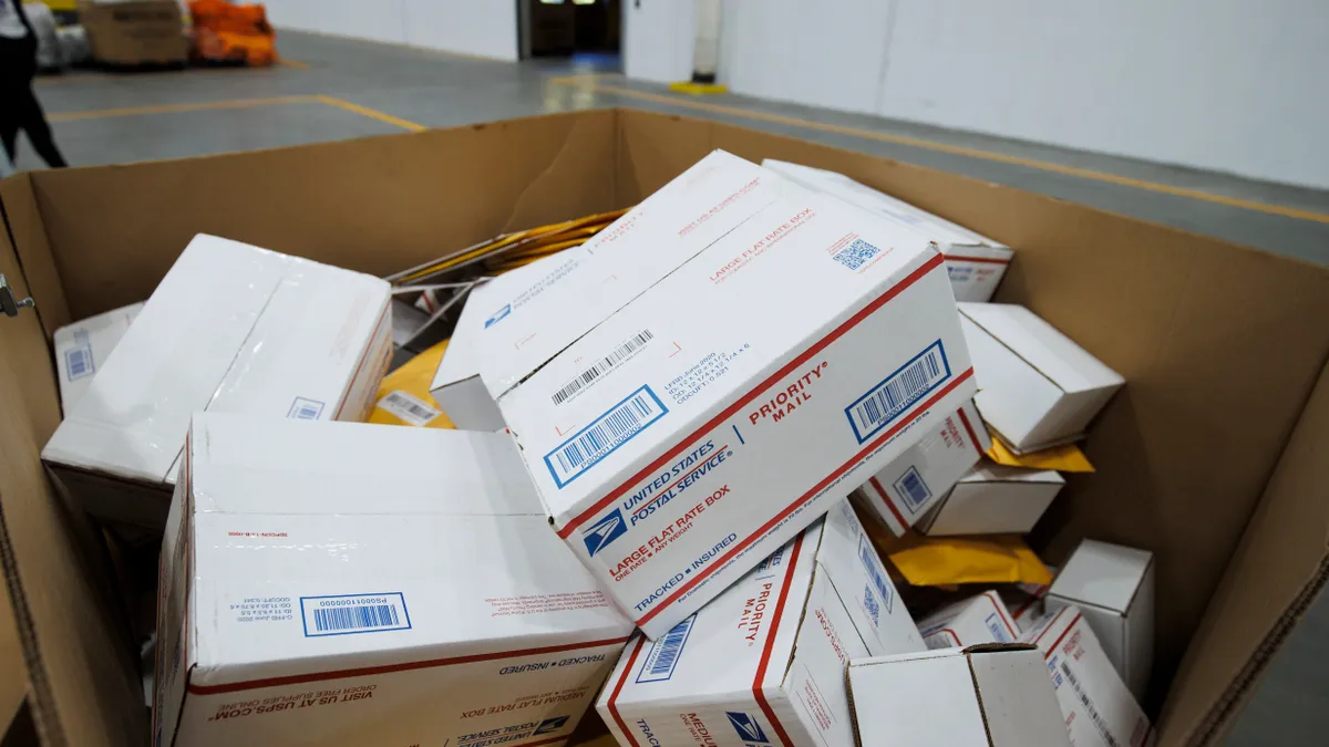 USPS test packages are featured in a machine setup in a La Vergne, Tennessee, facility.