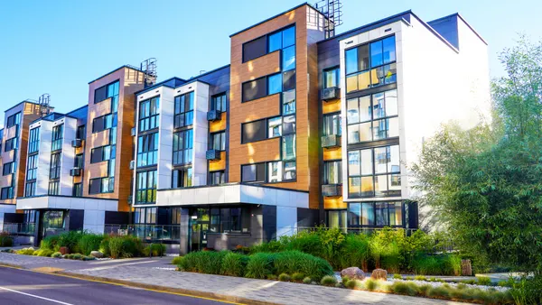 Modern residential building in contemporary architecture. Landscaping for urban spaces.