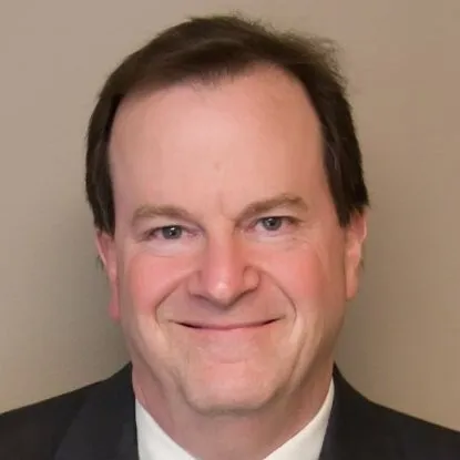 A headshot of outgoing Arko CFO Don Bassell.