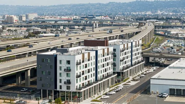 an aerial view of a modern apartment building