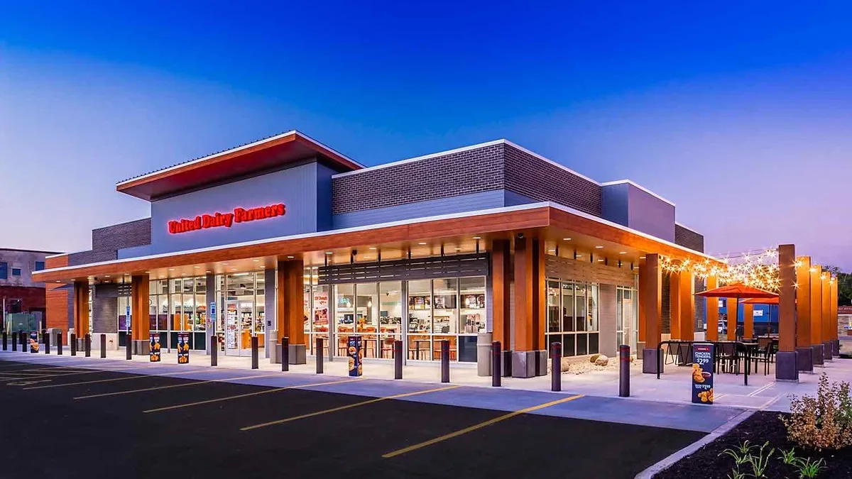 A rendering of the exterior of a United Dairy Farmers urban commercial store.