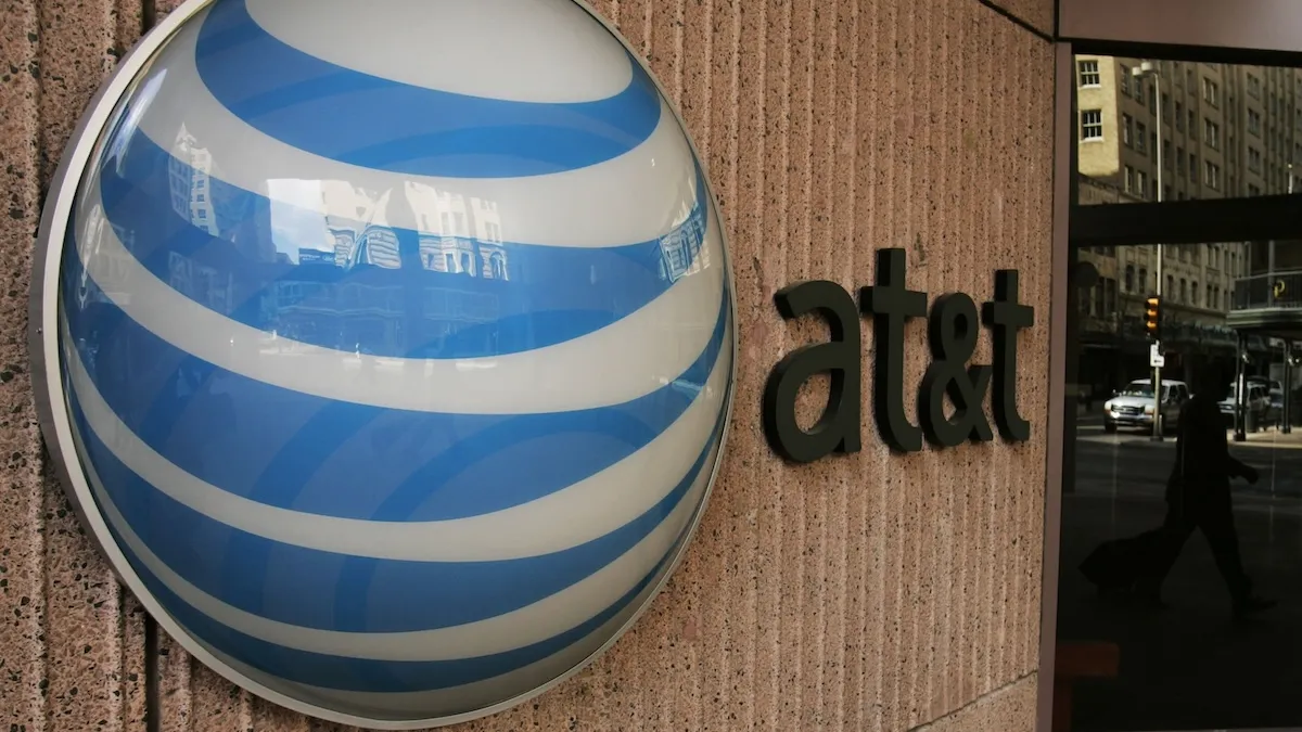 An AT&T sign stands atop a building July 9, 2001 in New York City.