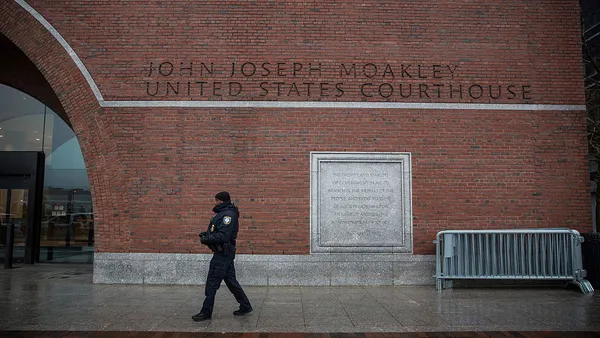 Police guard entrance to Moakley federal courthouse in Boston