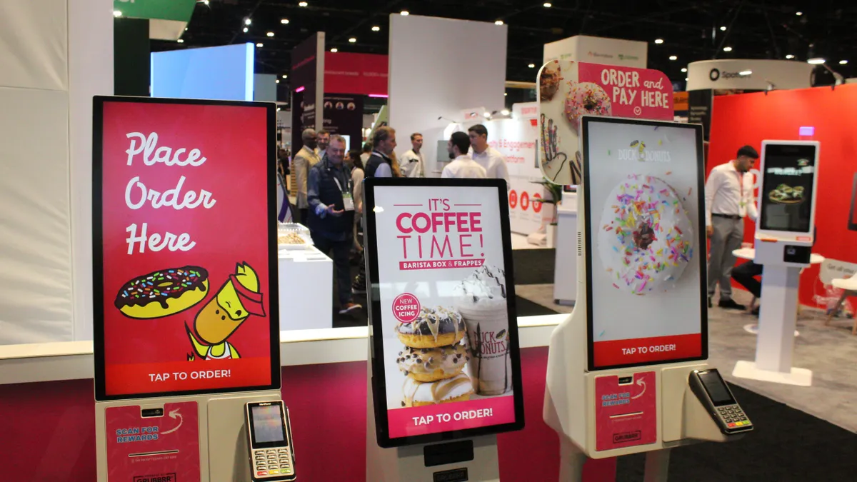 Grubbrr's kiosks on display at the National Restaurant Association Show in 2024.