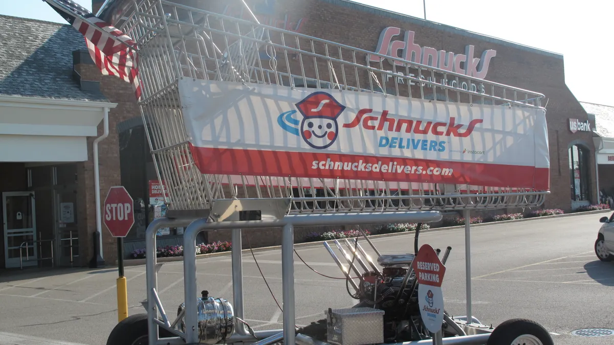 Exterior of Schnucks supermarket with shopping cart