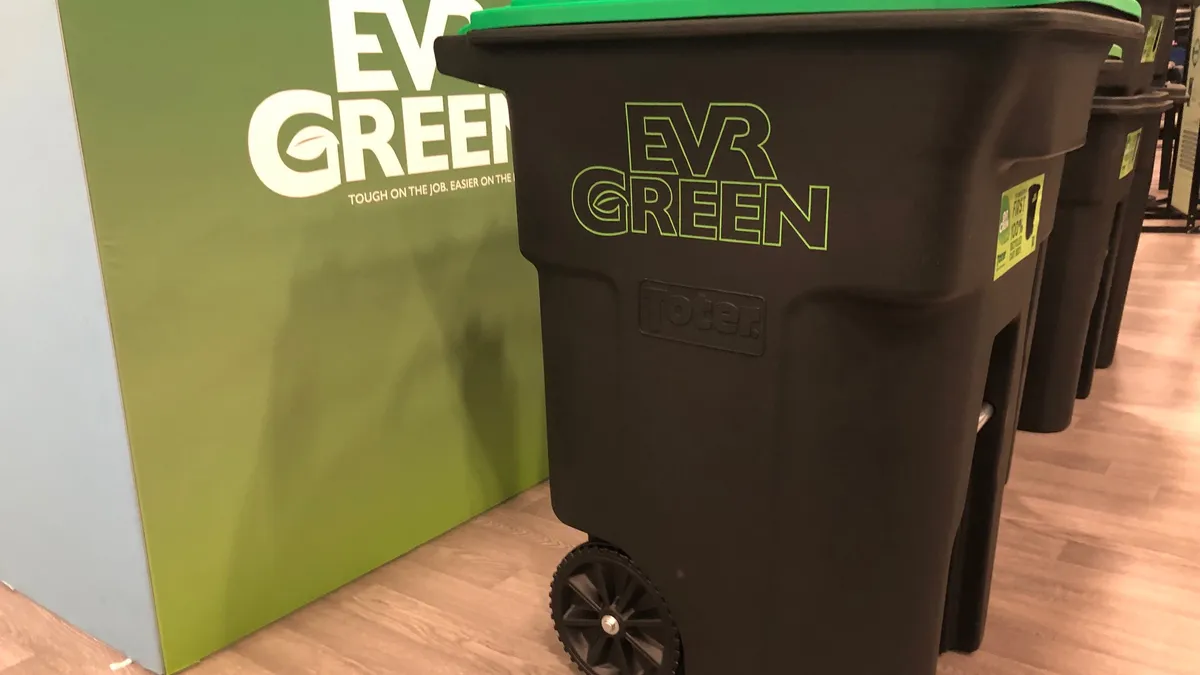 Wastequip (Toter) EVRGreen carts (touted for their recycled content) on display at WasteExpo 2022