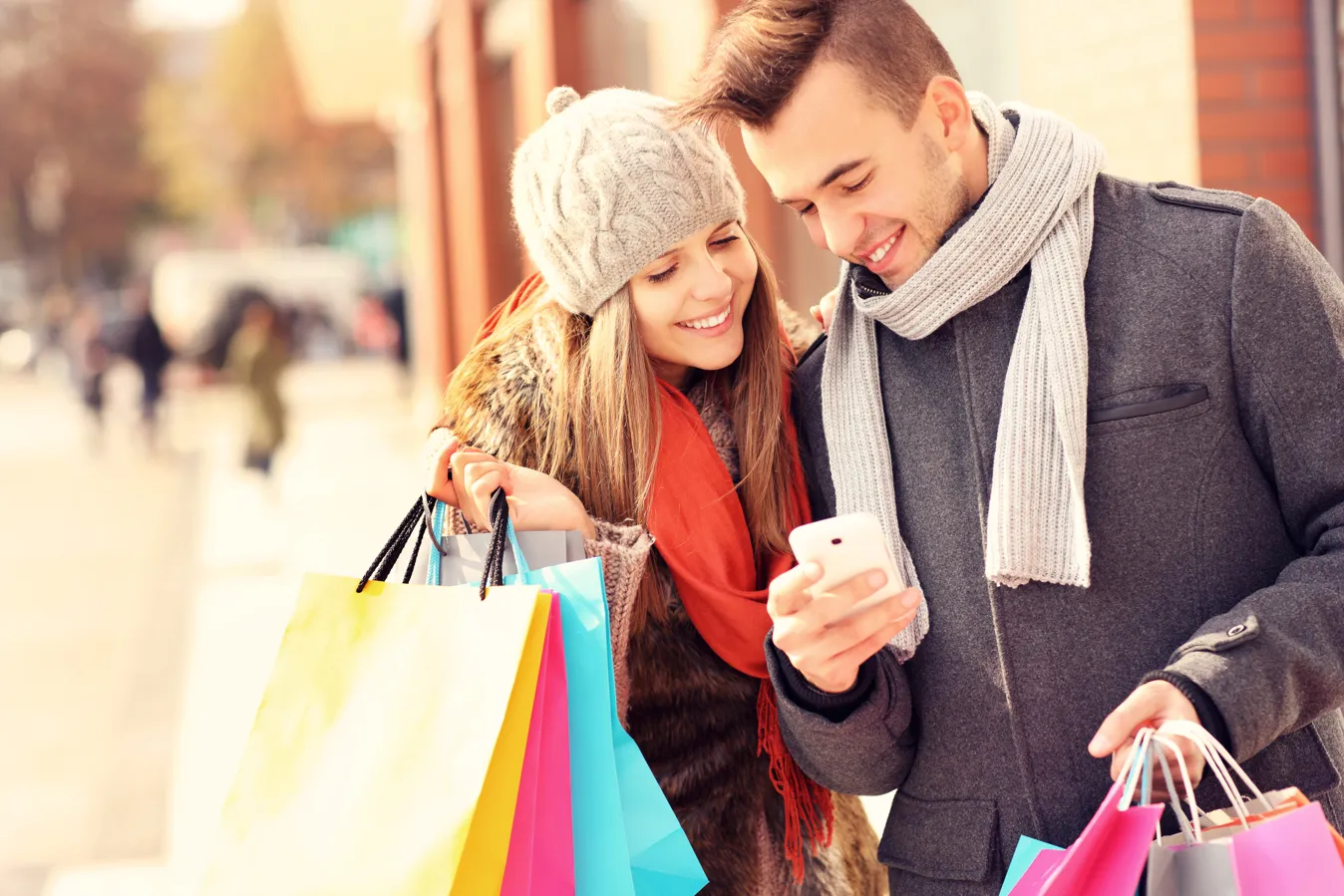 Couple with shopping bags in hand