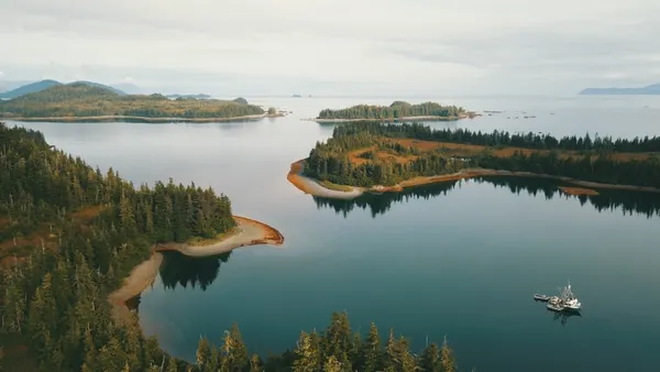 Image of water body with boat in the water
