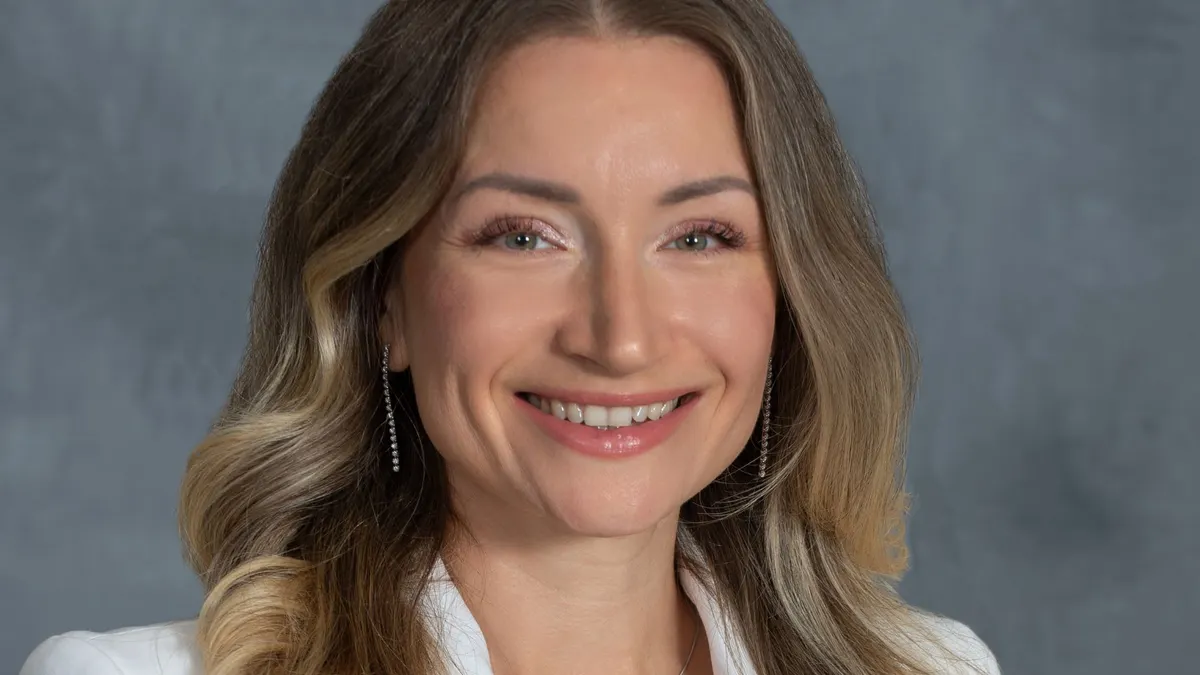 A professional headshot of Maria Gomelsky.