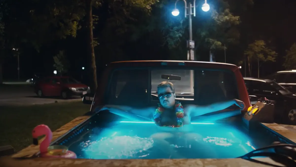 Harry's ad shows a man in a pickup truck hot tub