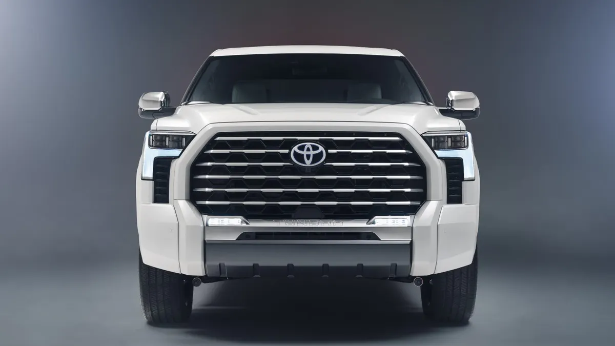 The front grill of a white 2024 Toyota Tundra pickup.