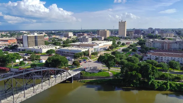 Aerial view downtown Waco from Washington Avenue Bridge cross Brazos River.