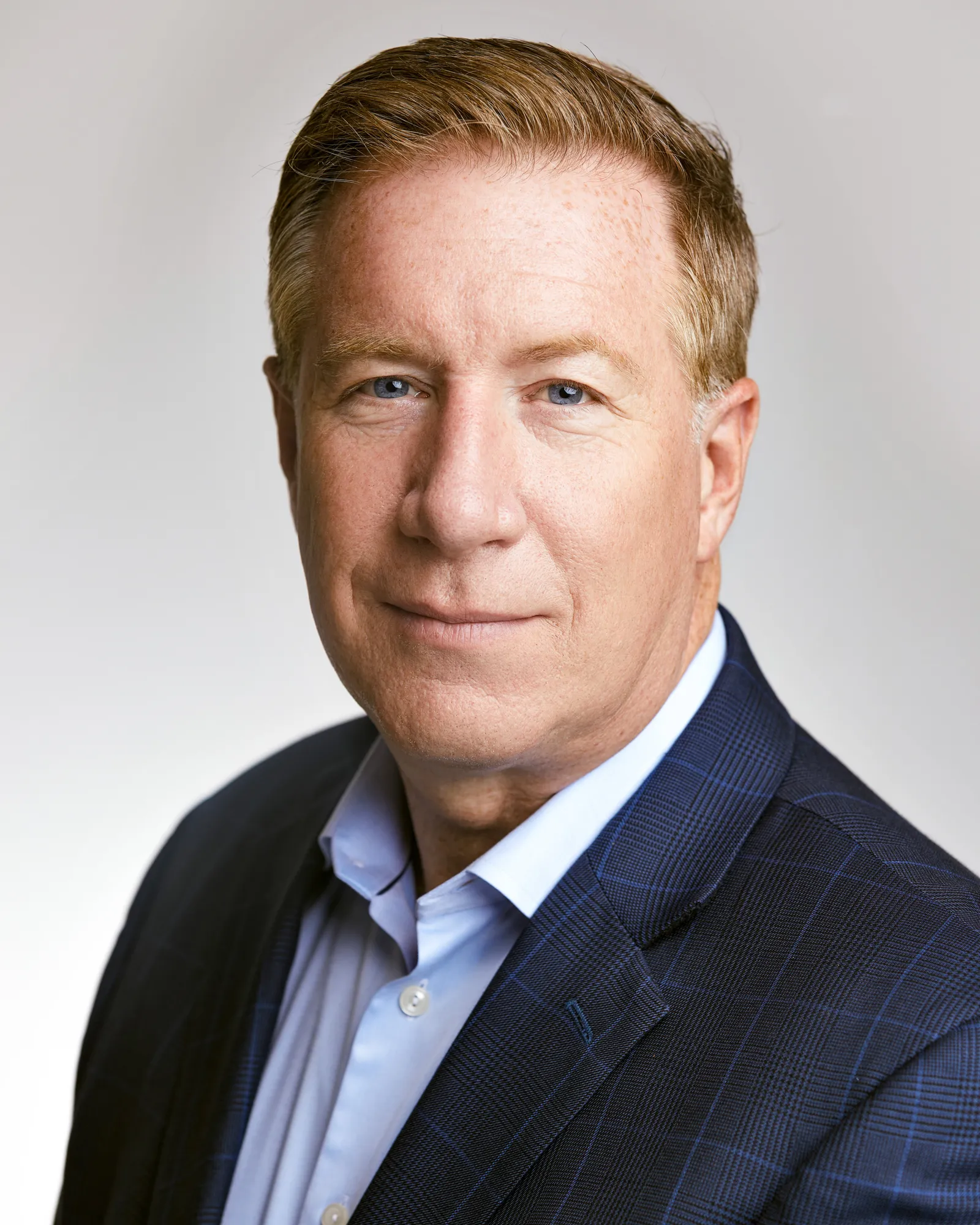 A headshot of James Rooney, CEO at Pretium Packaging.