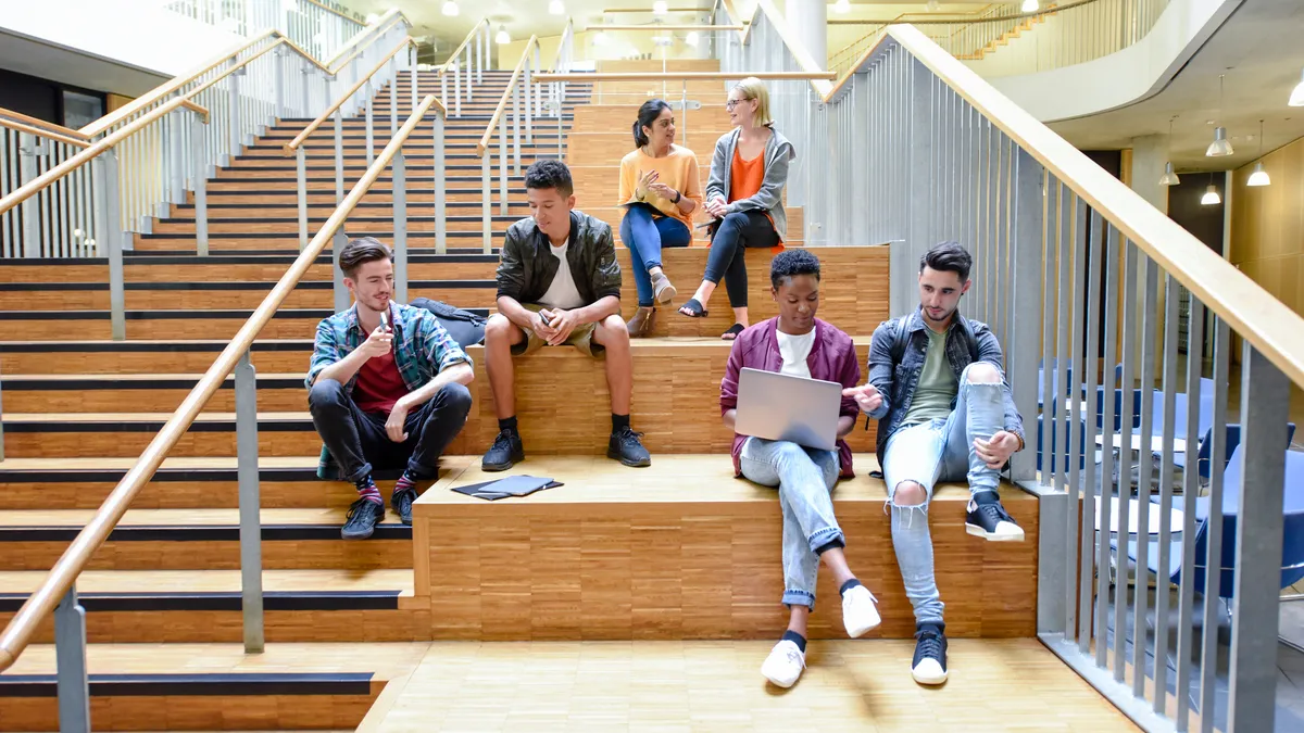 Students hanging out on a college campus