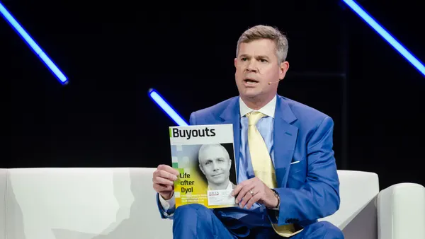 man holding a magazine
