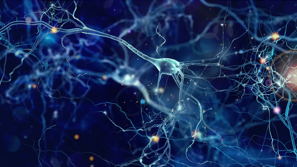An illustration of neuron cells in abstract dark space.