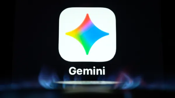 The icon for Google's Gemini AI app hovers in the center of the frame