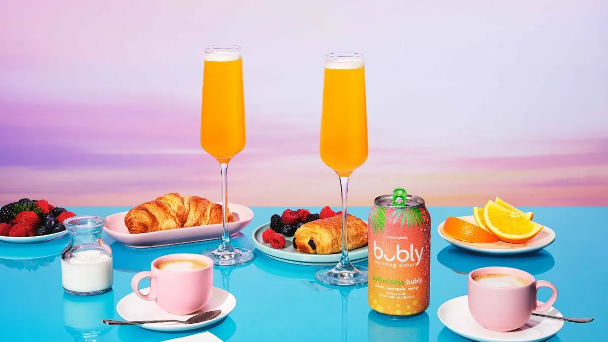 A bubly bellini bliss mocktail with several other beverages.