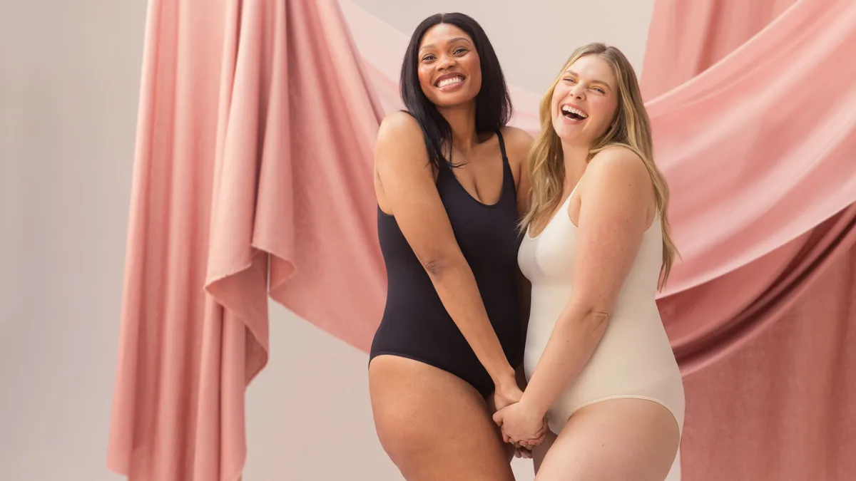 Two models pose for Shapermint