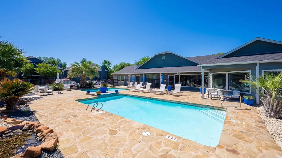 Pool and apartment community clubhouse