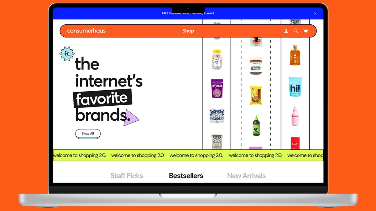 Open computer screen against an orange background showing the Consumerhaus homepage