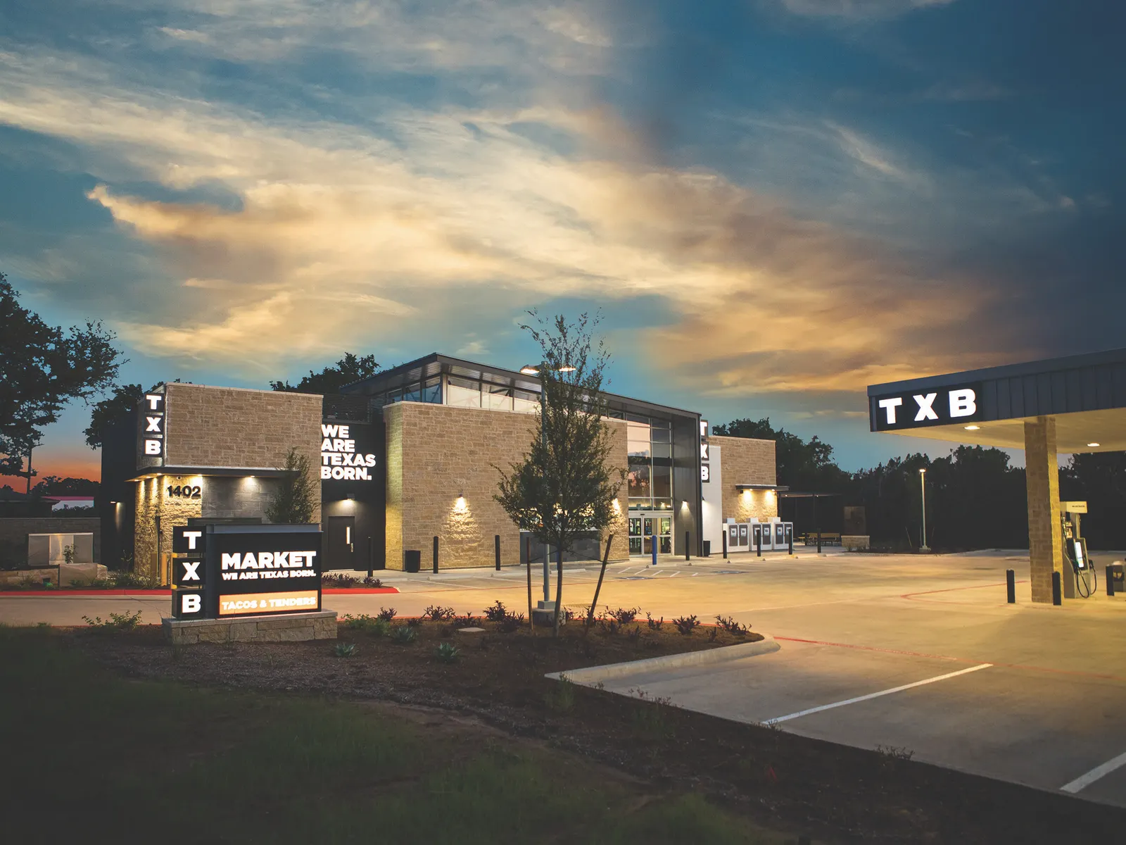 A photo of the exterior of a Texas Born or TXB convenience store.