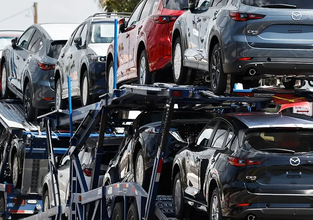 Tariffs swing volumes up and down for auto haulers