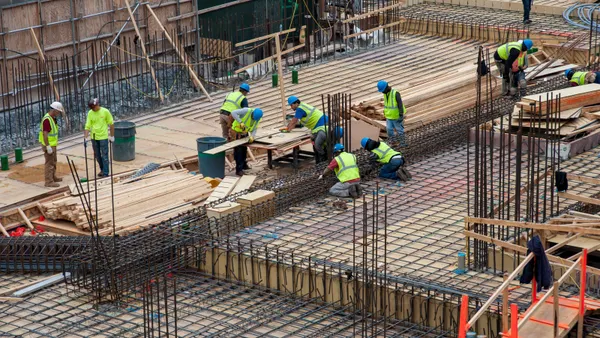 A group of construction workers on a jobsite.