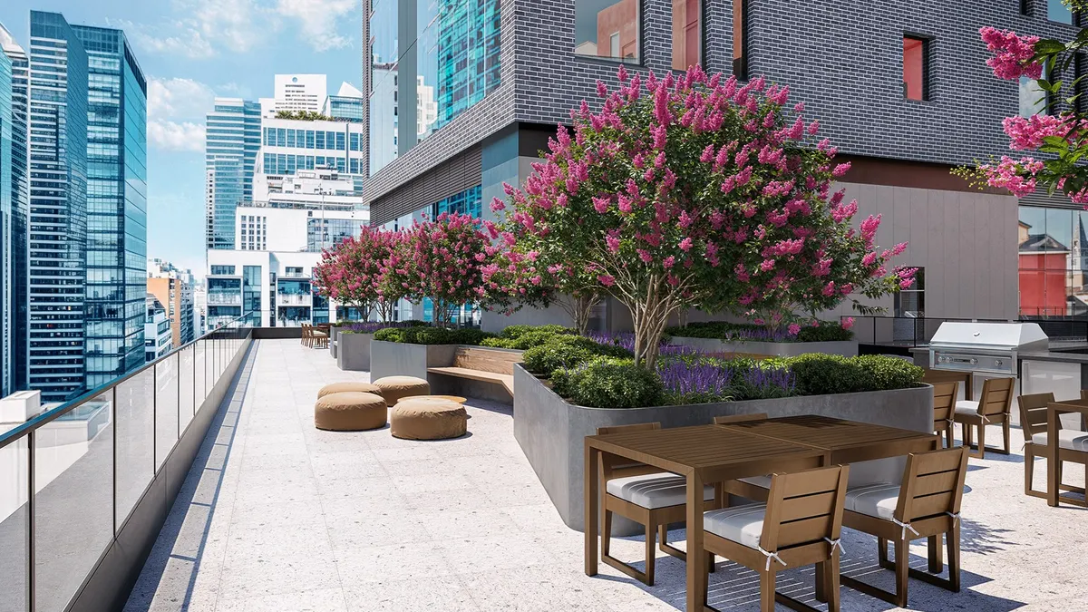 A patio in the middle of an apartment building.