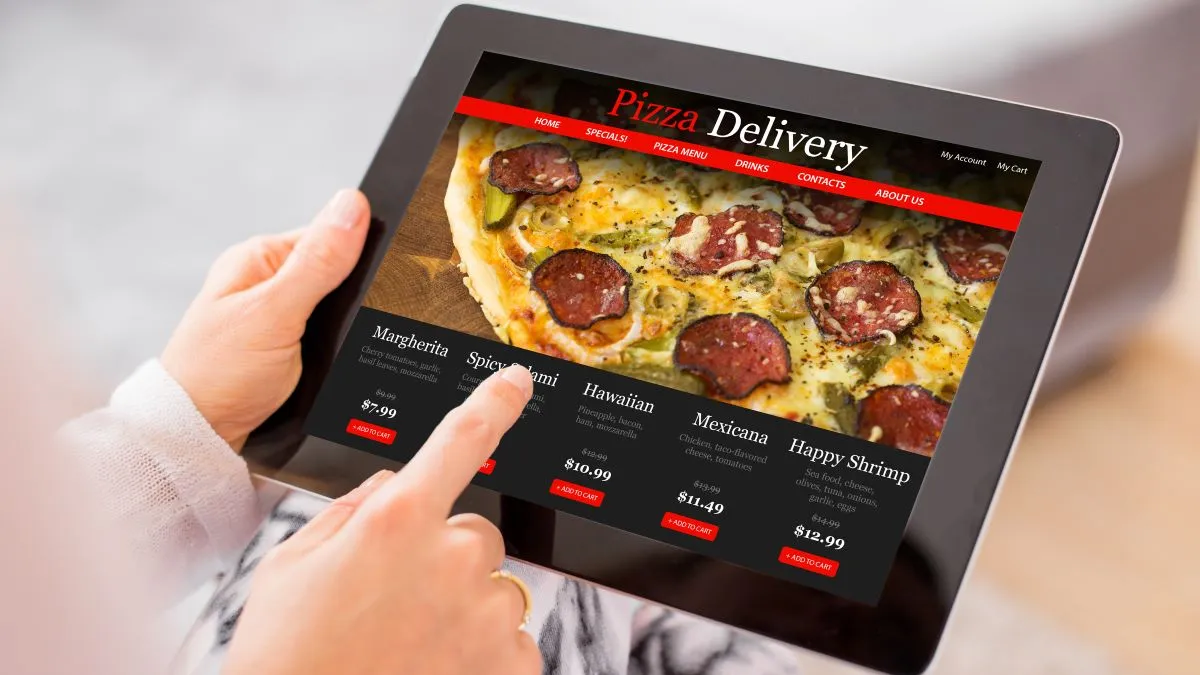 An image of a woman ordering from a restaurant website.