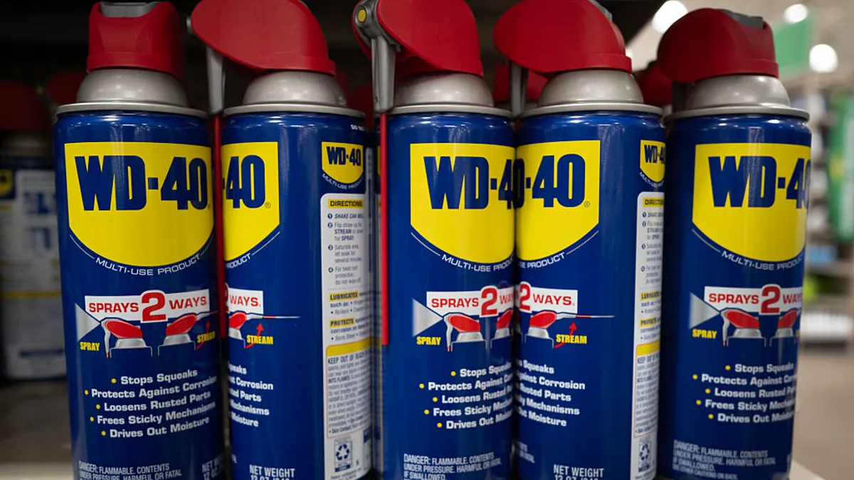 WD-40 products sit on a home improvement store shelf.