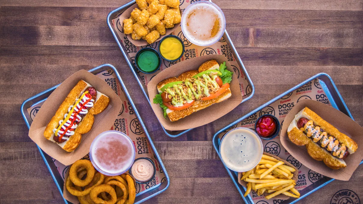 An image of hot dogs on a table.