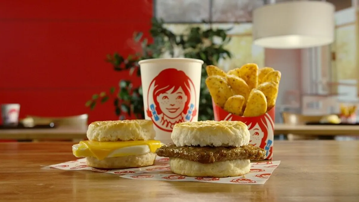 A promotional image for Wendy's 2-for-$3 breakfast bundles.