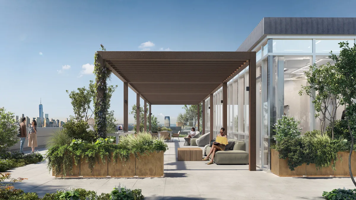 A rooftop lounge area covered in greenery.