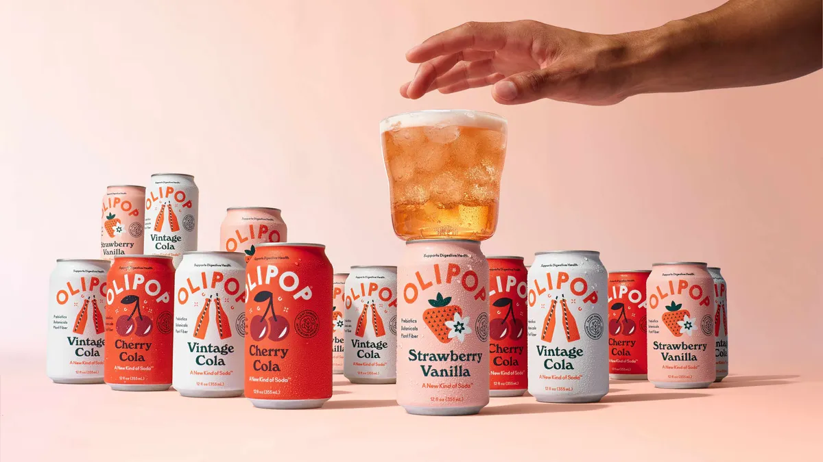 Cans of Olipop soda.